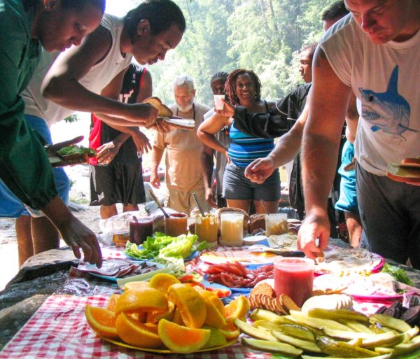 Guests eating lunch on the Chattooga River Rafting: Section IV (with Lunch) trip