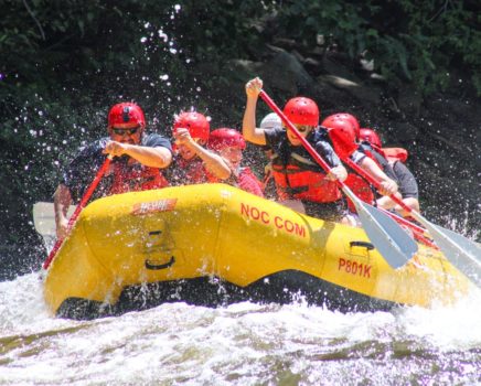 Upper Pigeon River Rafting at it's finest while the rafters are having a great time.