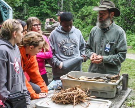 Youth learning Wilderness Survival Skills