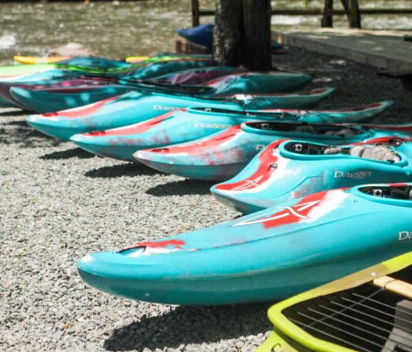 Blue kayaks in a row