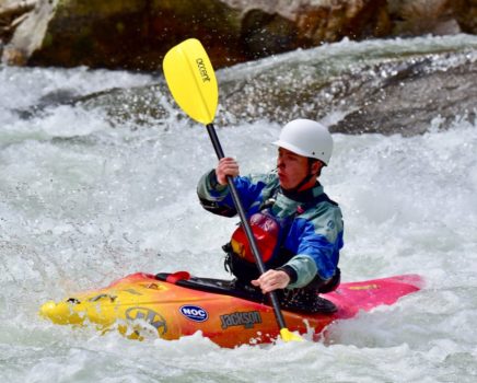kayaking through class 3 rapids