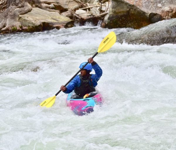 kayaking through class 3 rapids