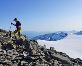 Mountain Climber above the peaks