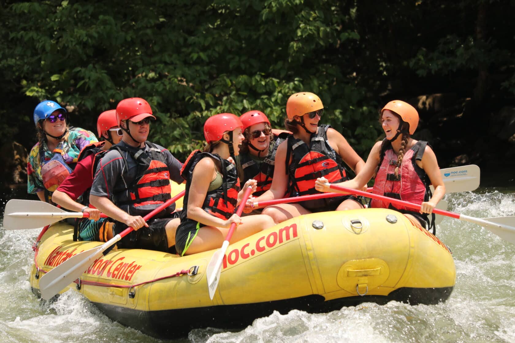 Group of people enjoying Ocoee River Rafting in beautiful Ocoee TN.